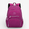 Sac à dos collège fille fuchsia grande capacité en nylon imperméable avec multiples poches zippées