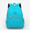Sac à dos collège fille turquoise grande capacité en nylon imperméable avec multiples poches zippées