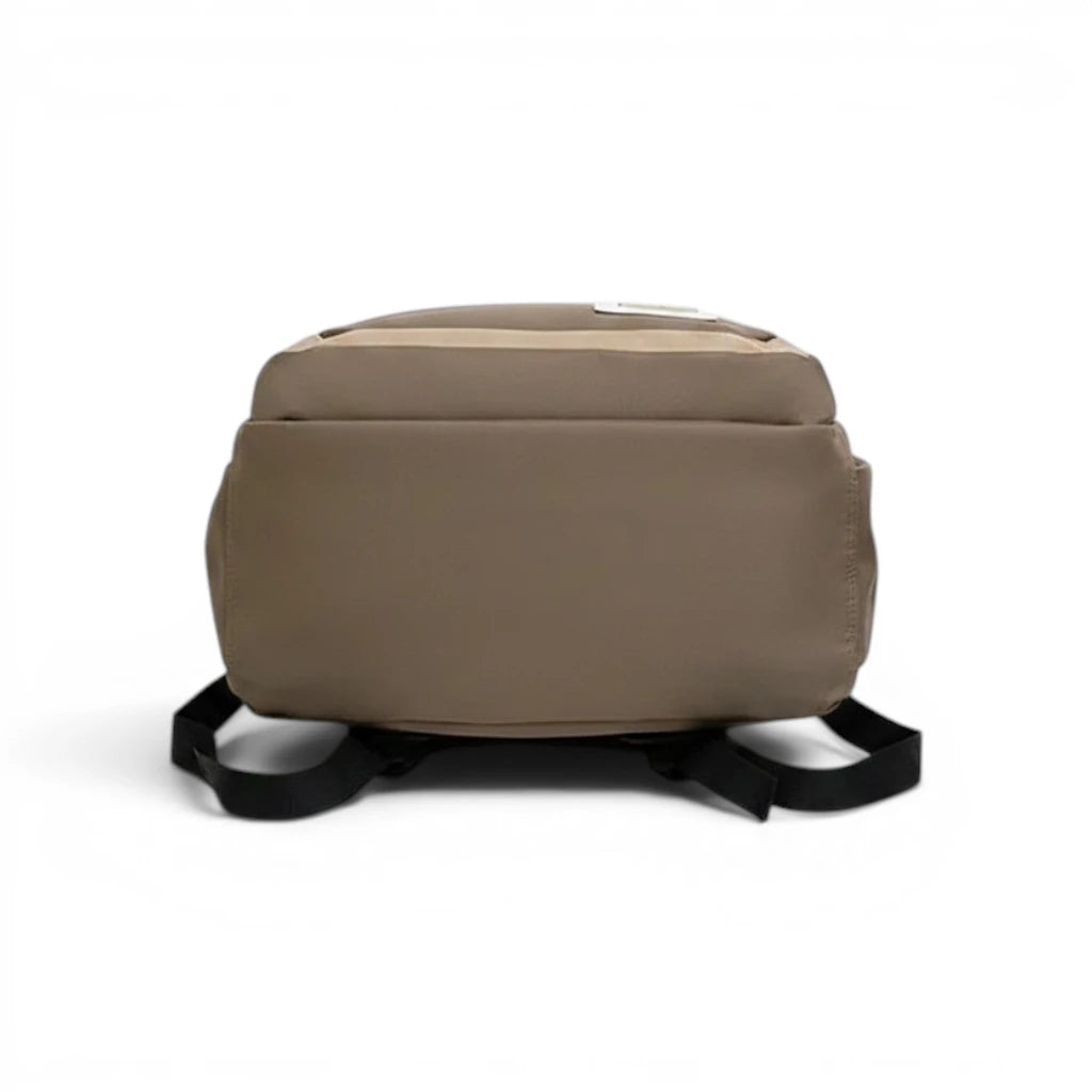Vue du dessous du sac à dos scolaire beige et blanc