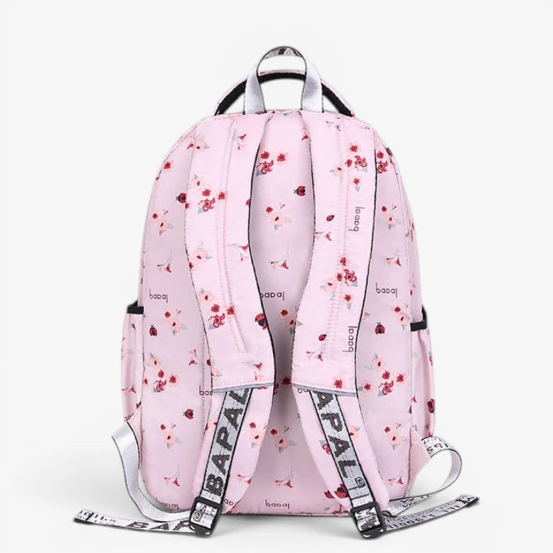 Vue arrière du sac à dos ergonomique rose à fleurs pour collège