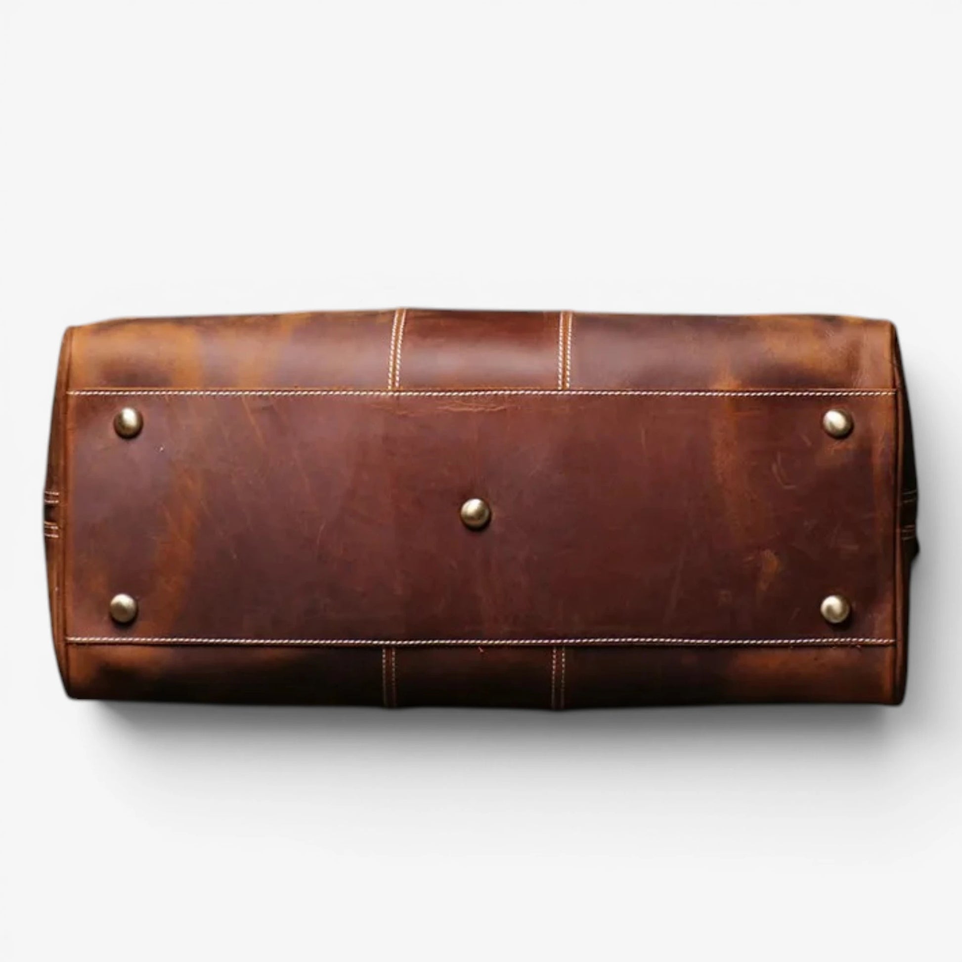 Fond renforcé du sac de voyage en cuir de vachette avec pieds de protection