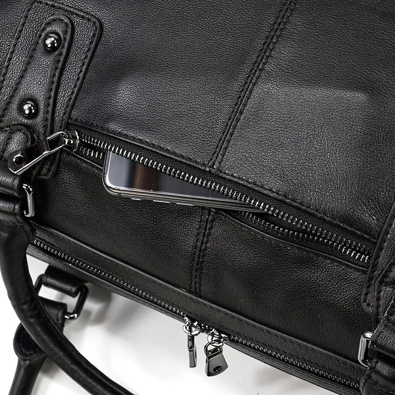 Poche extérieure zippée du sac de voyage en cuir véritable