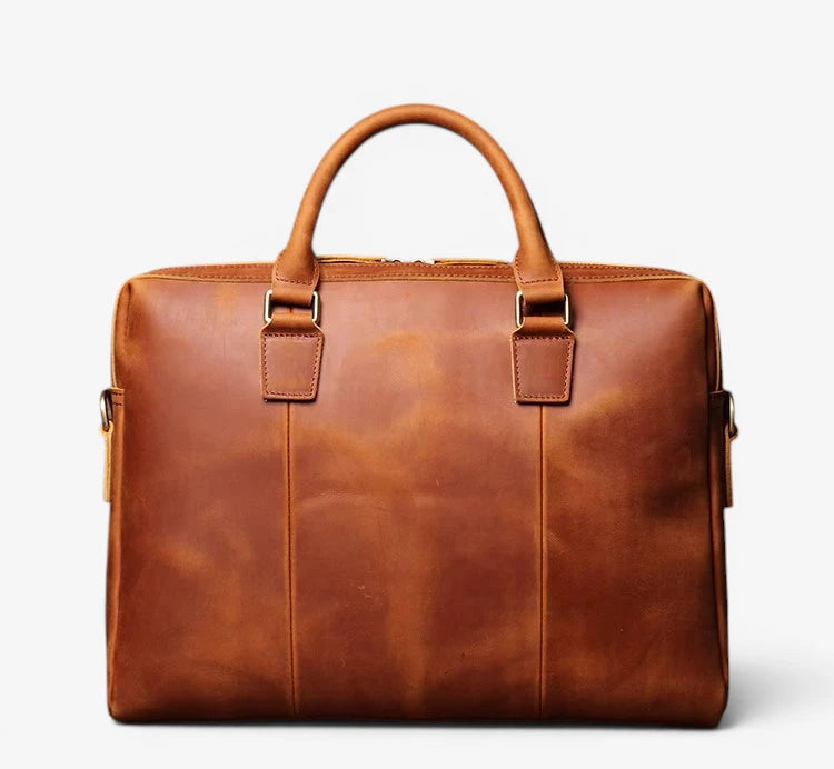 Vue arrière du porte-documents en cuir de vachette vintage marron clair avec poignée renforcée