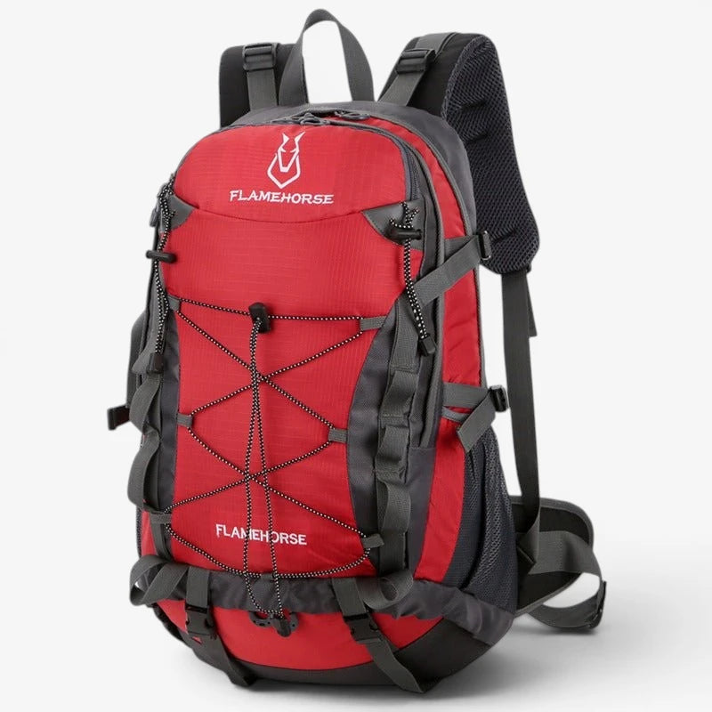 Sac à dos de randonnée 50L – modèle rouge avec sangles latérales et cordon élastique