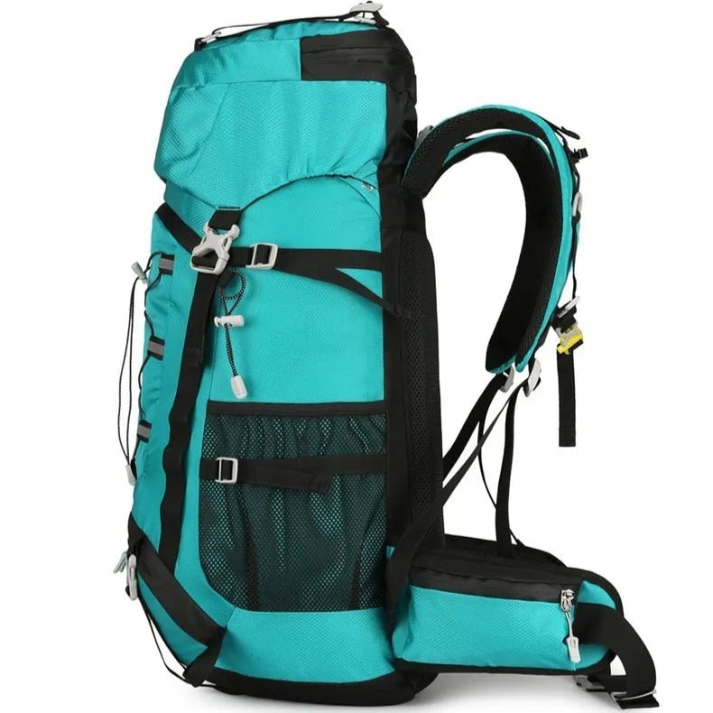 Vue latérale du sac à dos trekking 60L – bretelles ergonomiques, sangles ajustables et poches latérales extensibles
