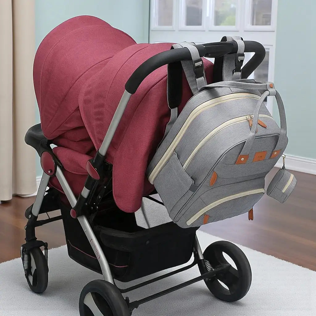 Sac à dos à langer 3 en 1 accroché à une poussette double avec attaches solides