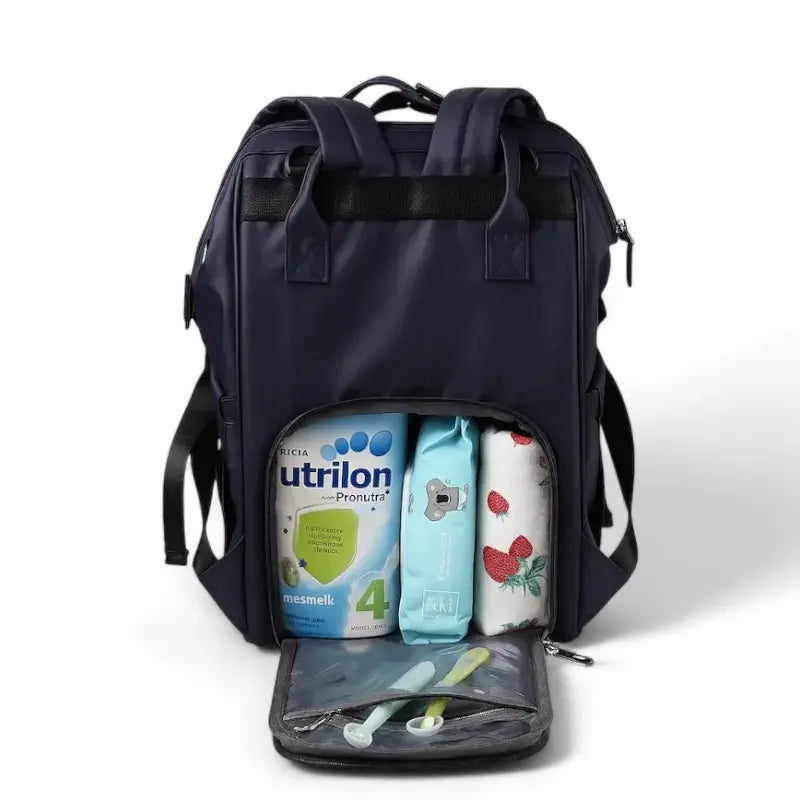 Sac à dos à langer bleu ouvert montrant l’intérieur avec biberons et accessoires
