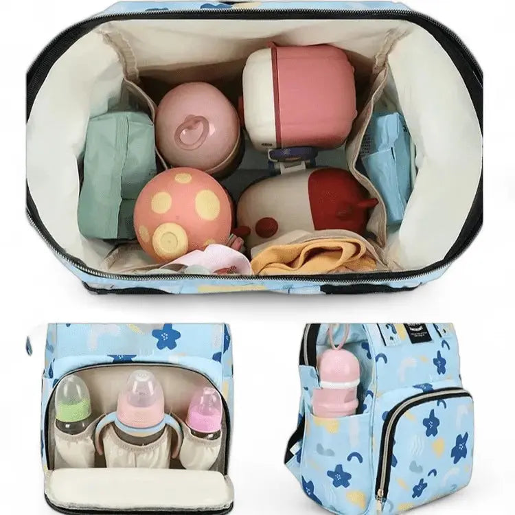 Intérieur du sac à dos à langer bleu motifs fleurs avec accessoires rangés