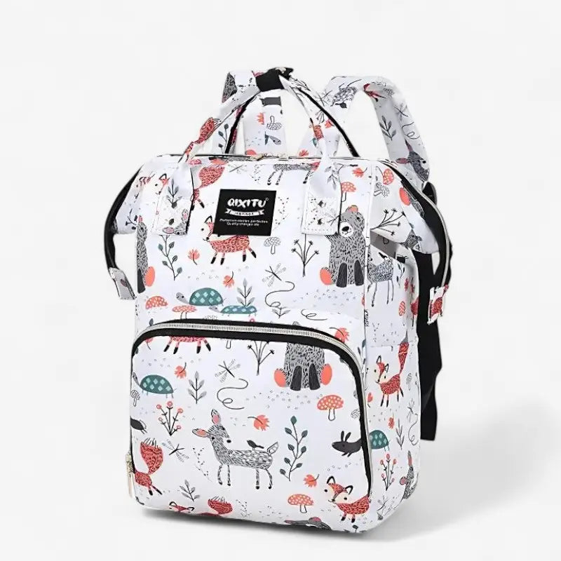 Sac à dos à langer étanche blanc avec motifs animaux et feuilles colorées