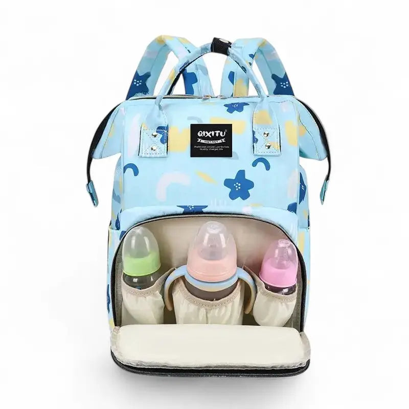Sac à dos à langer étanche bleu clair avec motifs fleurs et poches isothermes pour biberons