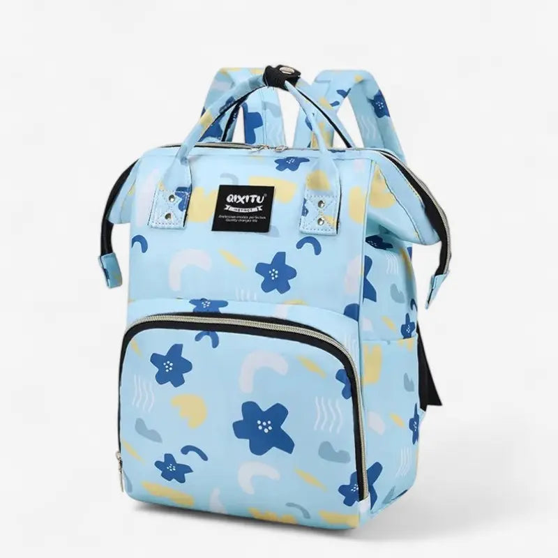 Sac à dos à langer étanche bleu clair avec motifs fleurs