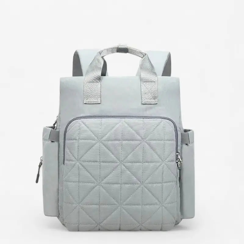 Sac à dos à langer gris avec attache poussette et grande poche avant matelassée