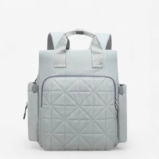 Sac à dos à langer gris avec attache poussette et grande poche avant matelassée