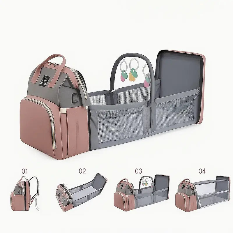 Sac à dos à langer rose et gris déplié en lit bébé avec étapes de montage
