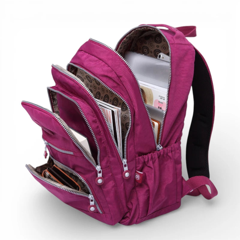 Sac à dos collège fille fuchsia avec compartiments multiples et rangement organisé