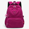 Sac à dos collège fille fuchsia grande capacité en nylon imperméable avec multiples poches zippées