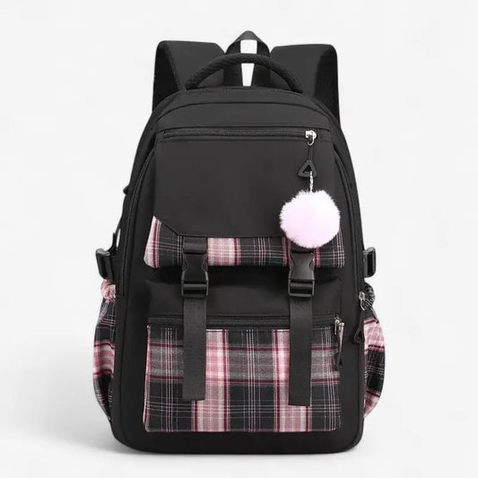 Vue de face du sac à dos collège noir avec pompon blanc et motif à carreaux rose