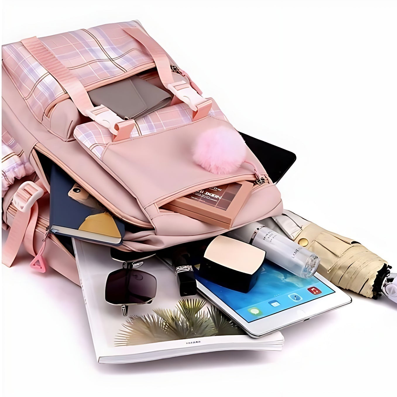 Sac à dos collège rose ouvert avec fournitures scolaires visibles (livres, tablette, trousse)