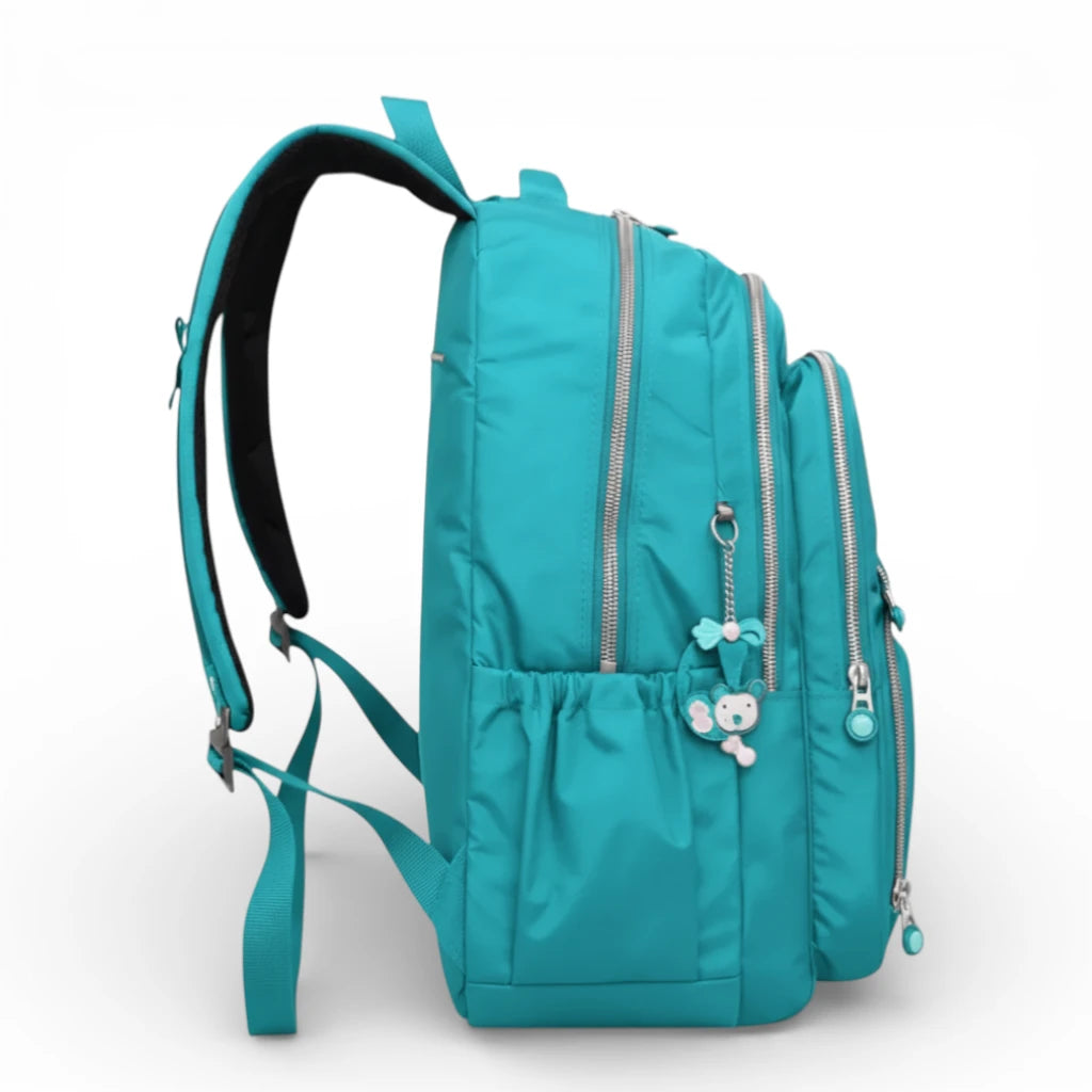 Sac à dos scolaire turquoise vue latérale avec poche bouteille