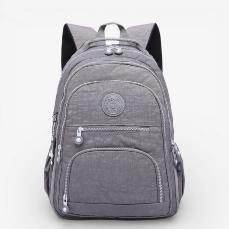 Sac à dos collège garçon gris grande capacité en nylon imperméable avec poches zippées