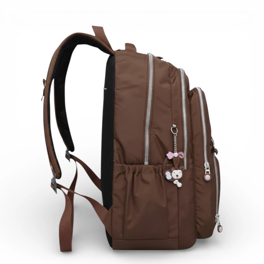 Sac à dos scolaire marron vue latérale avec poche bouteille