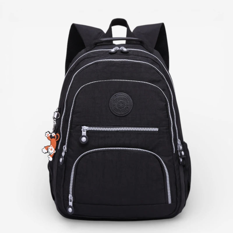 Sac à dos collège garçon noir grande capacité en nylon imperméable avec poches zippées