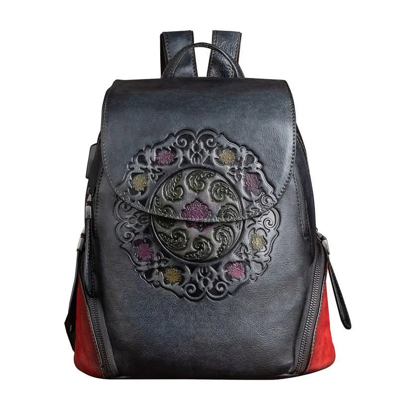 Sac à dos en cuir de vachette gaufré noir avec motif floral ethnique en relief