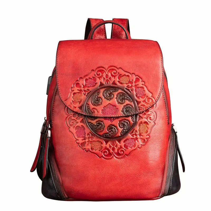 Sac à dos en cuir de vachette gaufré rouge avec motif floral ethnique décoratif
