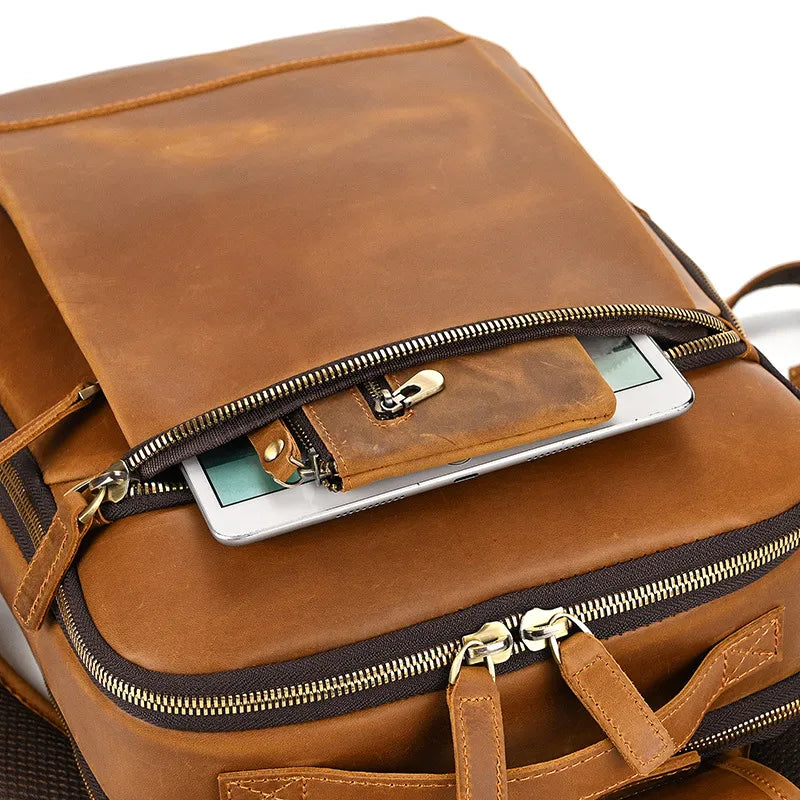 Poche avant zippée du sac à dos en cuir vintage avec rangement accessible