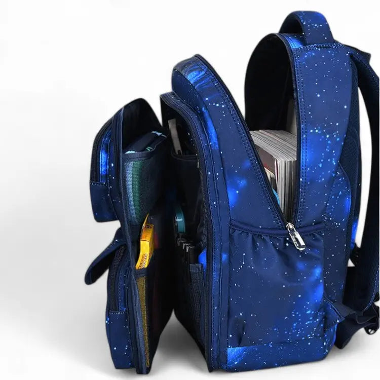 Sac à dos ergonomique bleu motif galaxie – vue ouverte montrant le rangement interne