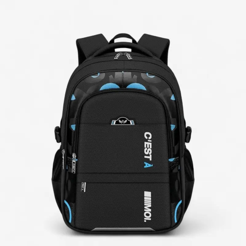 Sac à dos scolaire ergonomique bleu pour garçon, avec soutien dorsal et motifs géométriques, adapté au primaire et au collège.