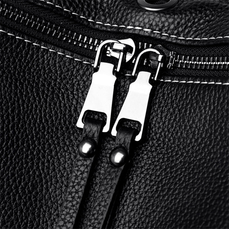 détail fermeture éclair métallique double sac à dos femme cuir noir