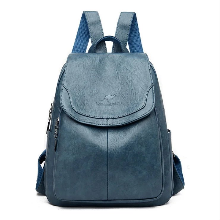 Sac à dos femme en cuir synthétique bleu clair avec poches latérales et rabat arrondi