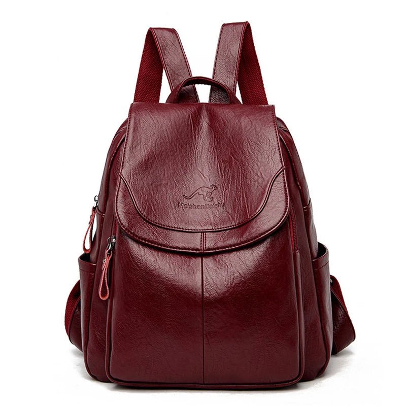 Sac à dos femme en cuir synthétique bordeaux souple avec poches latérales