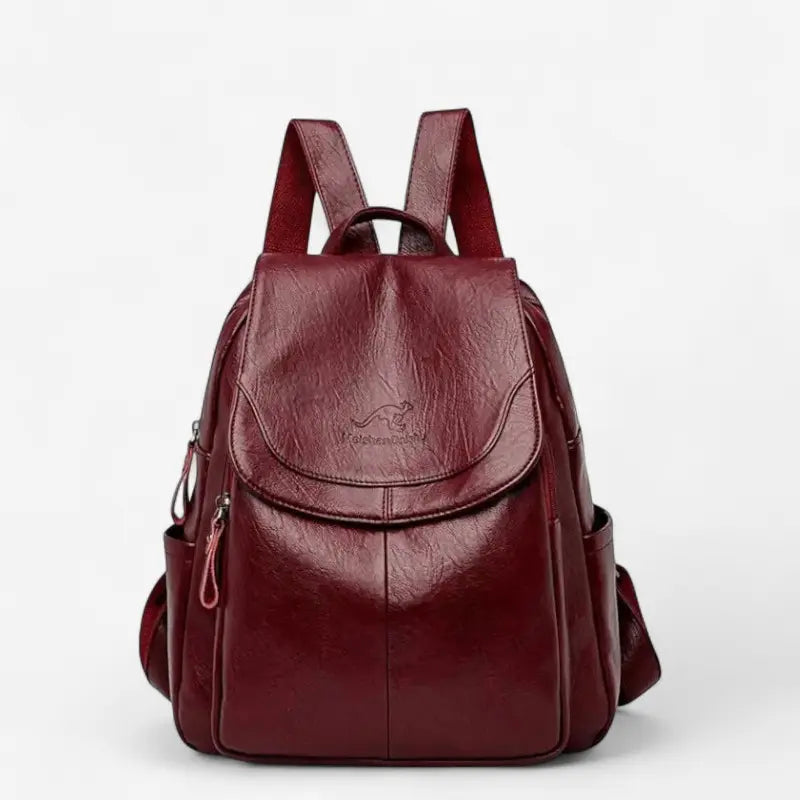 Sac à dos femme en cuir synthétique bordeaux souple avec poches latérales