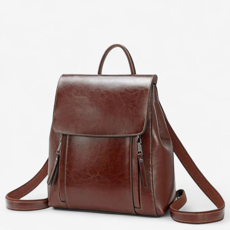 Sac à dos femme en cuir véritable marron, vue avant avec poche zippée