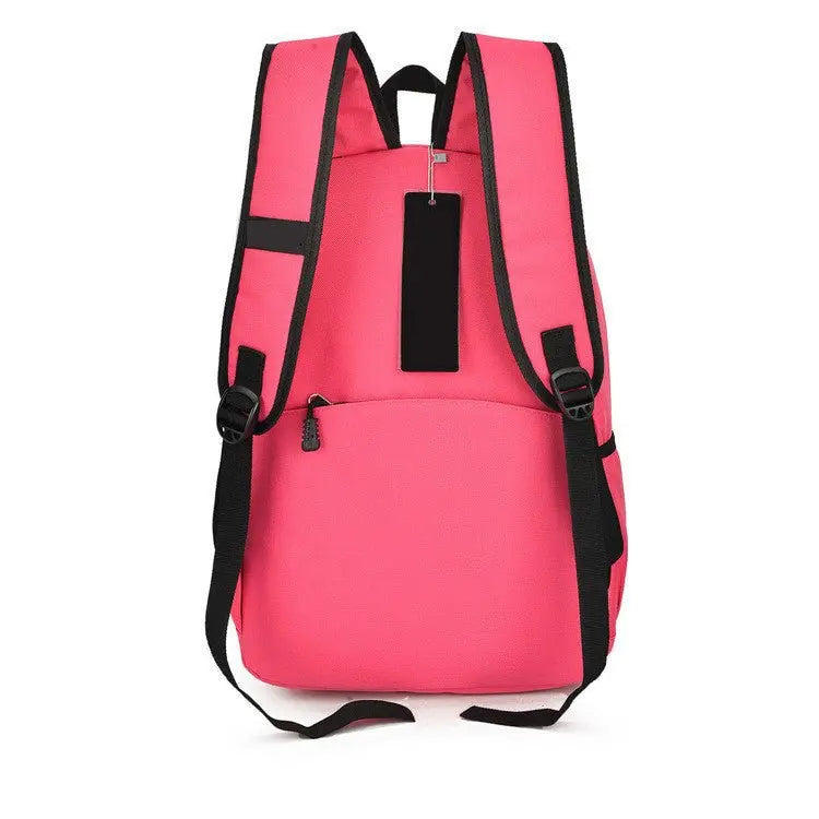 Sac à dos fille rose avec oreilles de chat vu de dos