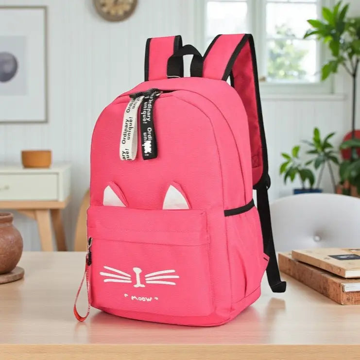 Sac à dos fille rose avec oreilles de chat vu de profil