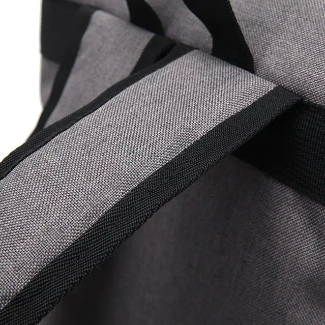Anse supérieure renforcée du sac à dos gris unisexe avec couture solide