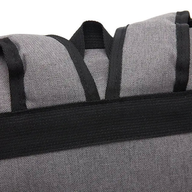 Poignée haute et dos matelassé du sac à dos gris unisexe