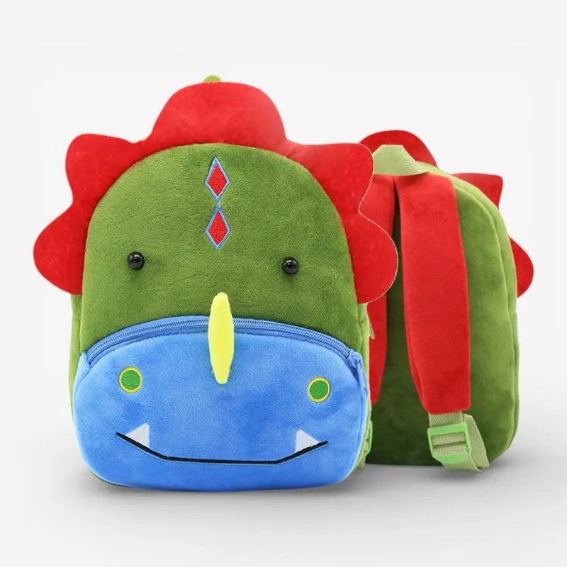 Vue trois quarts du sac à dos maternelle en peluche dinosaure