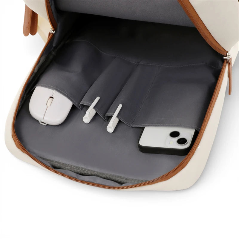 Intérieur du sac à dos ordinateur portable avec poches organisées pour accessoires