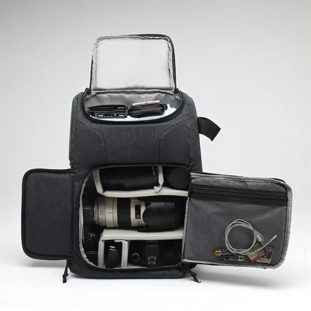 Sac à dos photo noir ouvert montrant compartiments modulables pour appareil photo