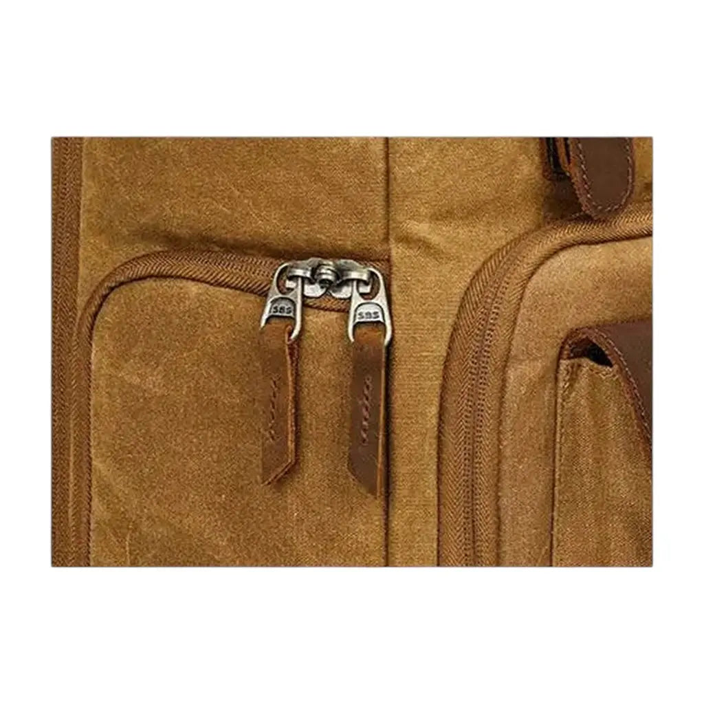 Gros plan sur fermeture éclair renforcée du sac à dos photo vintage étanche en toile