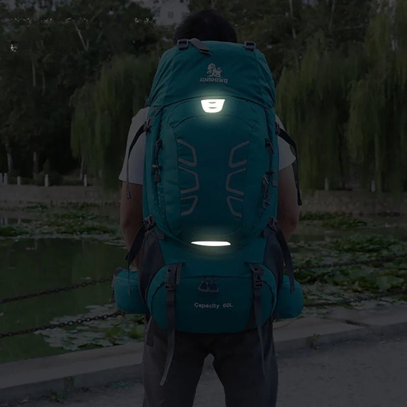 Sac à dos de randonnée 60L turquoise avec bandes réfléchissantes visibles la nuit pour la sécurité