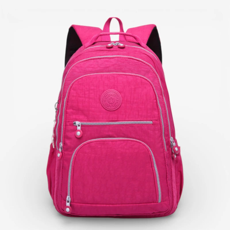 Sac à dos scolaire rose 35L pour collège en nylon imperméable avec multiples poches zippées