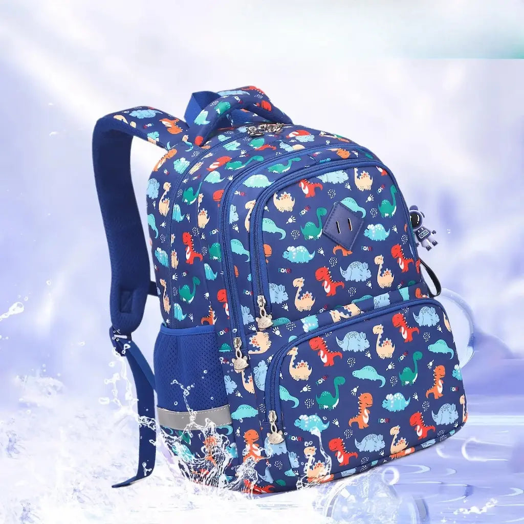 Sac à dos scolaire enfant bleu à motifs dinosaures, imperméable et résistant à l’eau.