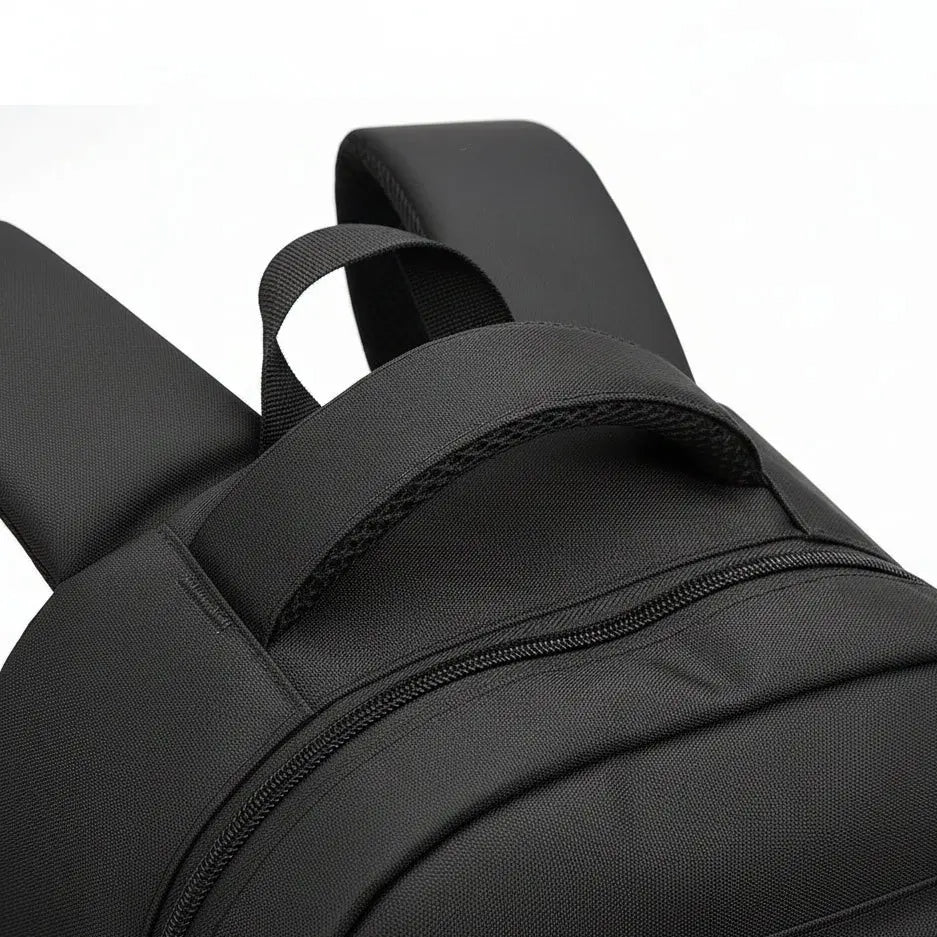 Poignée renforcée du sac à dos scolaire ergonomique garçon noir et bleu pour usage quotidien