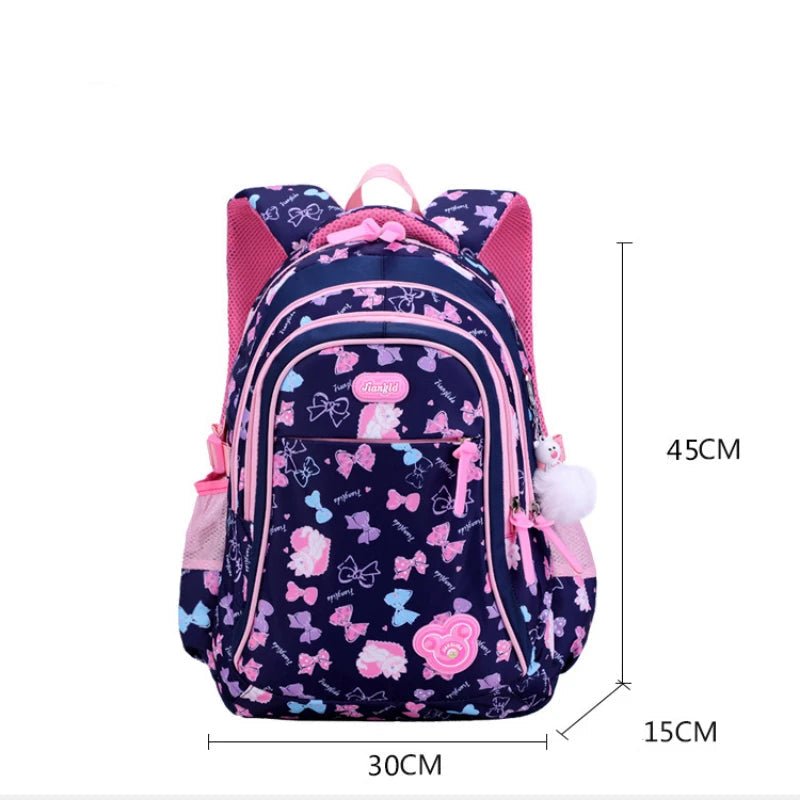 Sac à dos scolaire fille bleu marine et rose avec dimensions 45 × 30 × 15 cm.