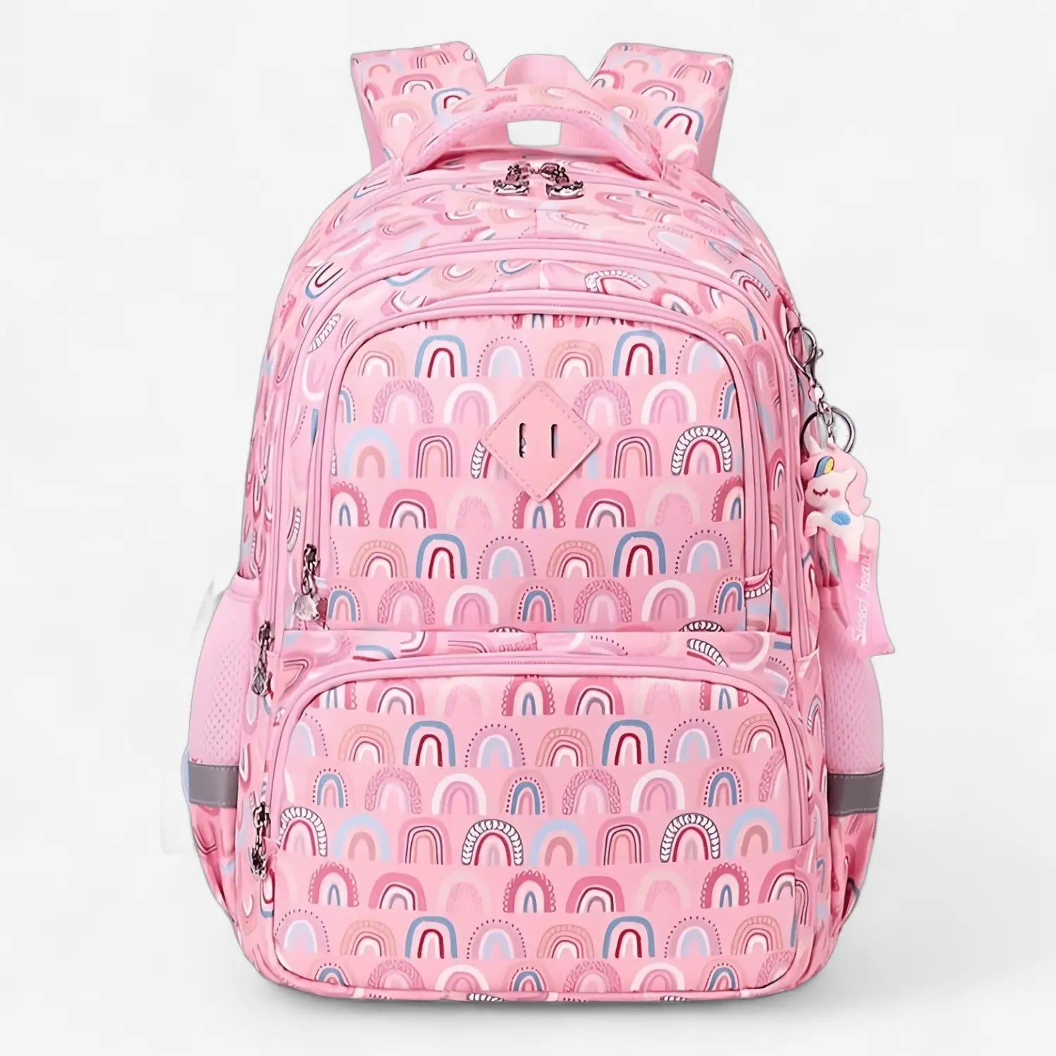 Sac à dos scolaire rose pour fille avec motifs arcs-en-ciel, poches multiples et bretelles rembourrées.